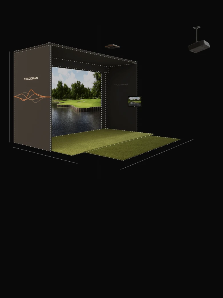 A golf simulator setup with a large screen displaying a golf course, surrounded by a mat and tracking equipment.
