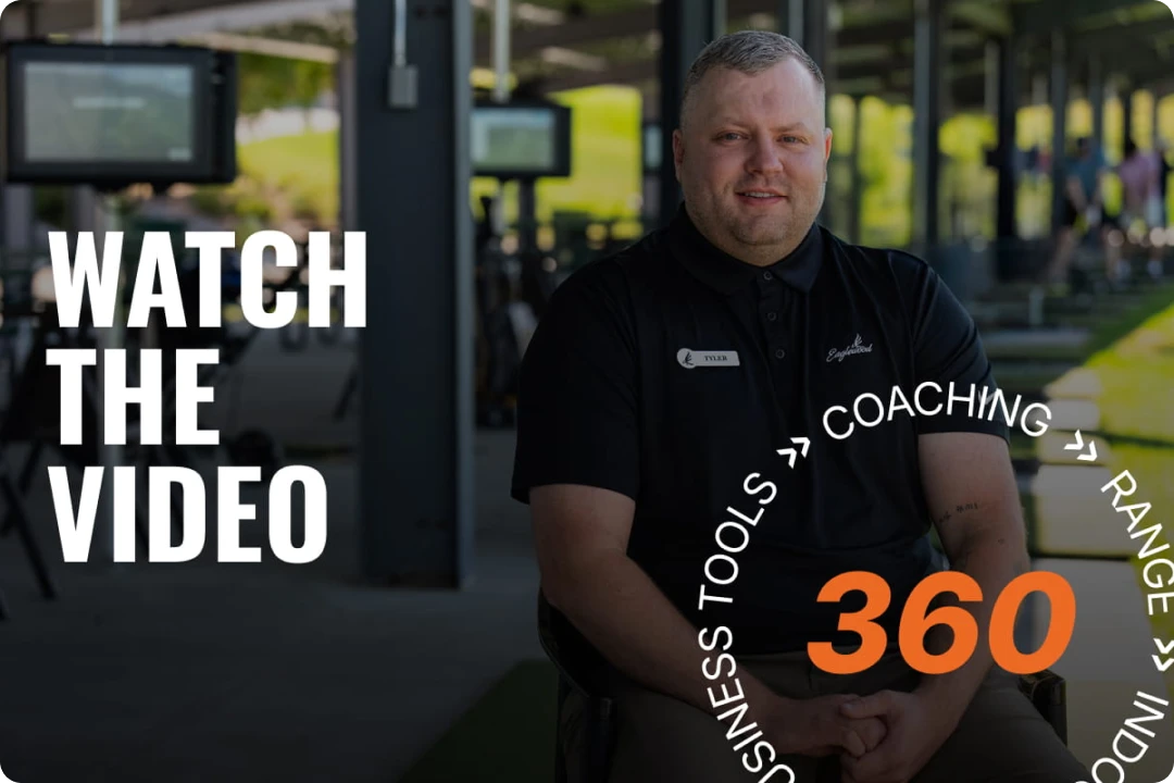A man in a golf facility wearing a name tag sits smiling. The text reads "WATCH THE VIDEO" and "360" surrounded by words like Coaching and Tools.