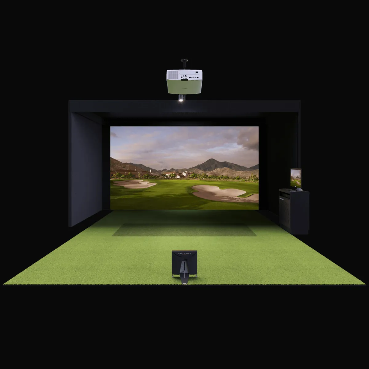 Indoor golf simulator: dark enclosed room with green turf, ceiling projector, launch monitor and large screen showing a golf course.
